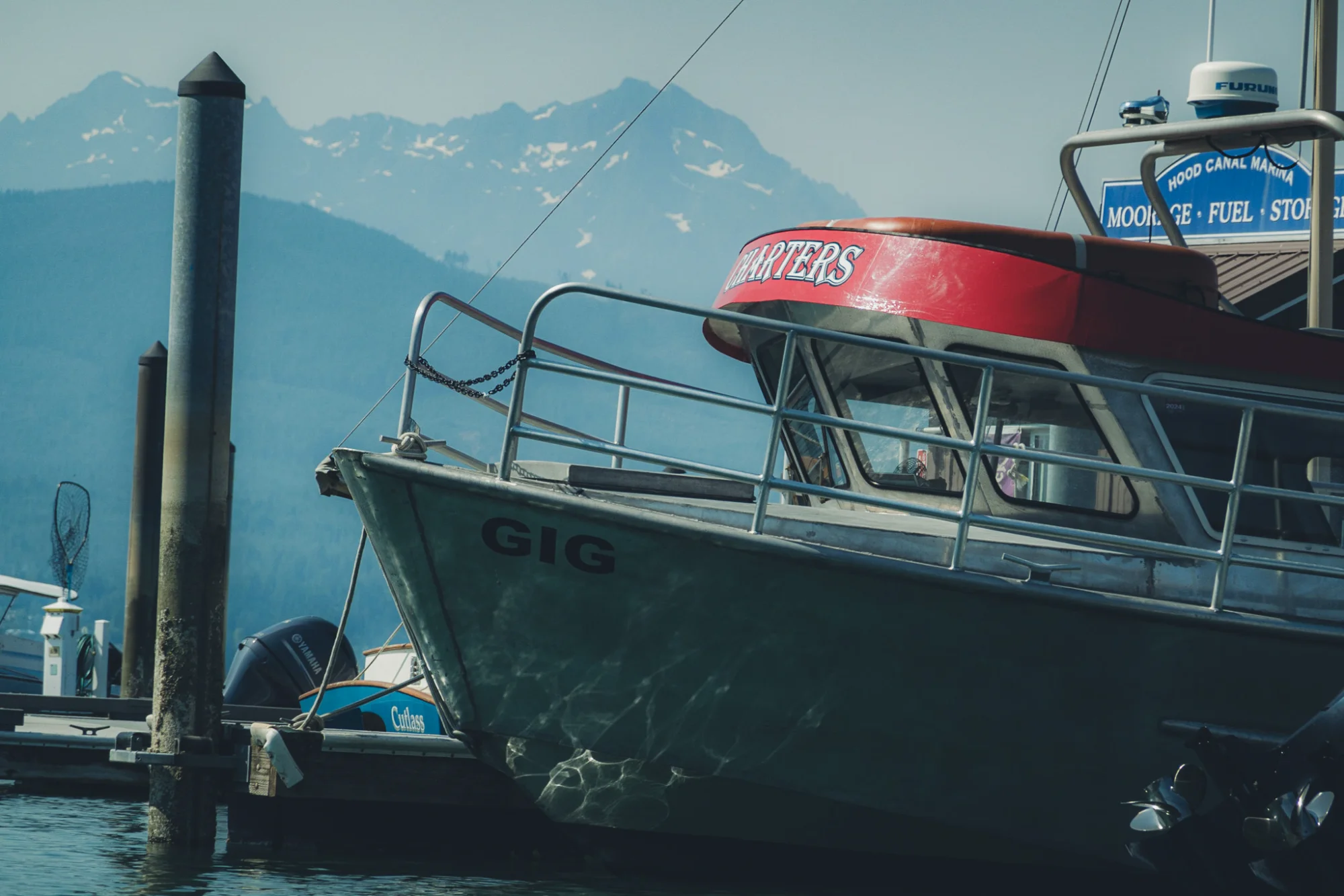 Boat at Union dock with mountain backdrop